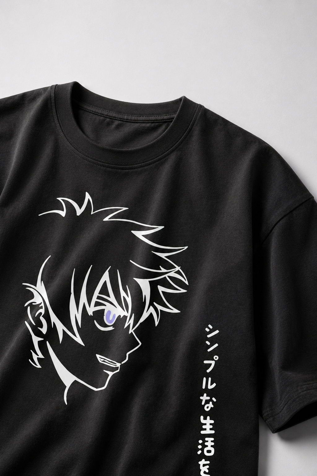 Two t-shirts with graphic designs on a light gray background