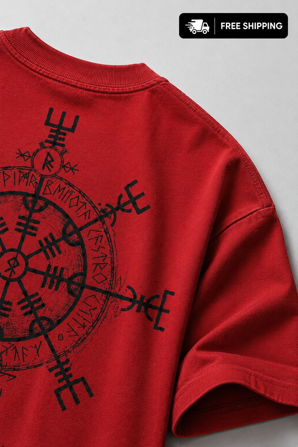 Close-up of red oversized t-shirt fabric with black washable DTF graphic print