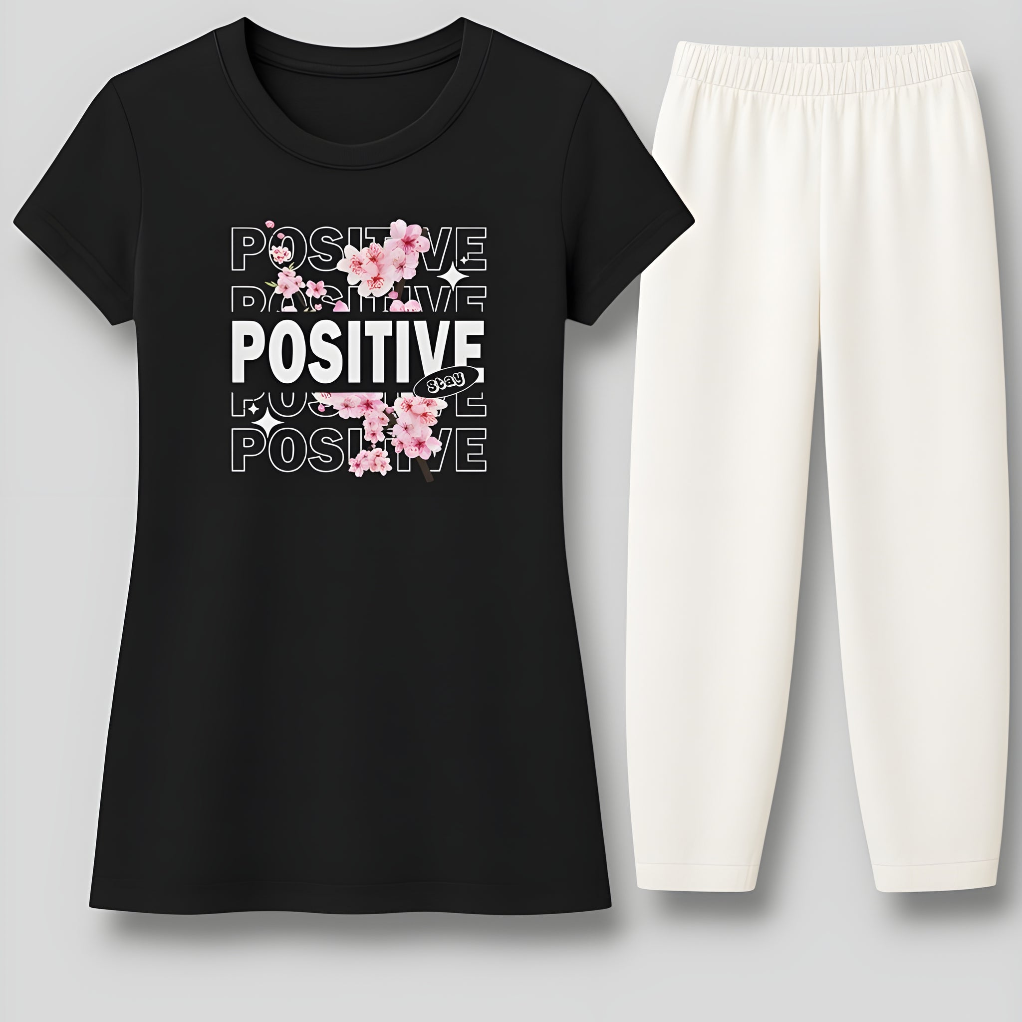 "Women's black long skirt-style t-shirt with white loose-fit summer trousers - flat lay front view - AUA&CO"
