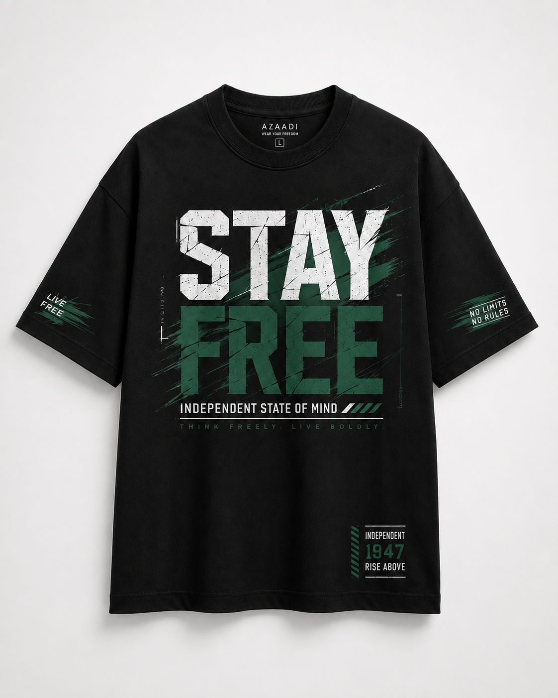 A black short-sleeve graphic t-shirt with 'STAY FREE' printed on the front in distressed white and green lettering, displayed against a light gray background.