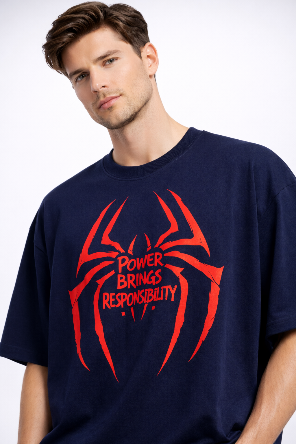 Man wearing a navy blue t-shirt with a red spider graphic and text on a white background