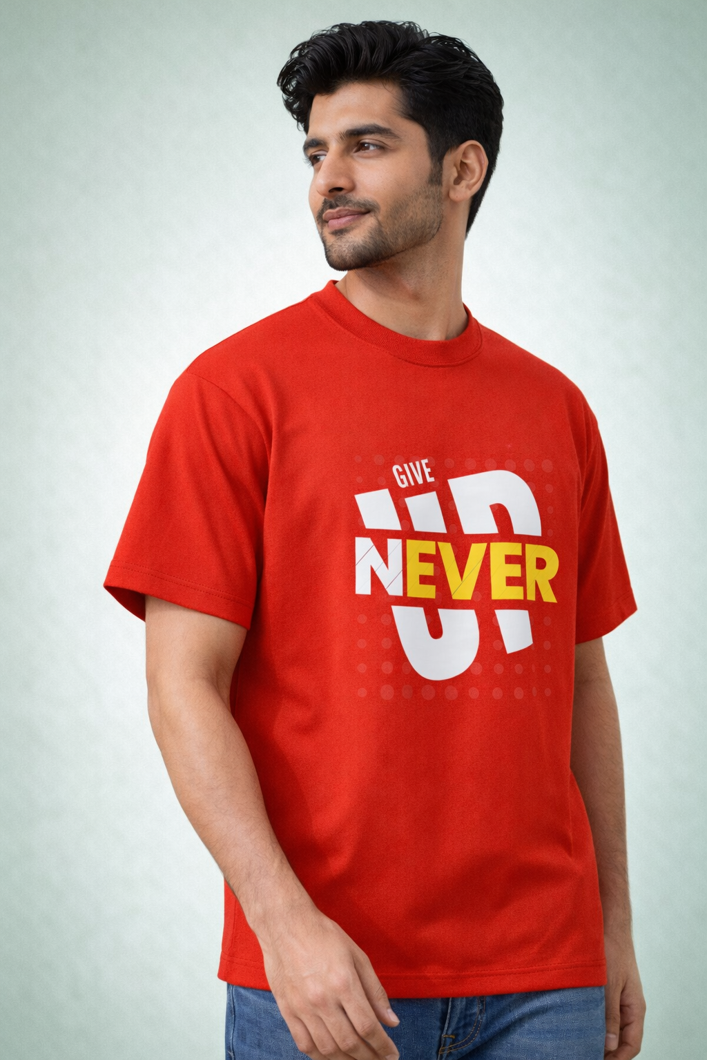 Man wearing a red t-shirt with 'Never Give Up' text on a light gray background