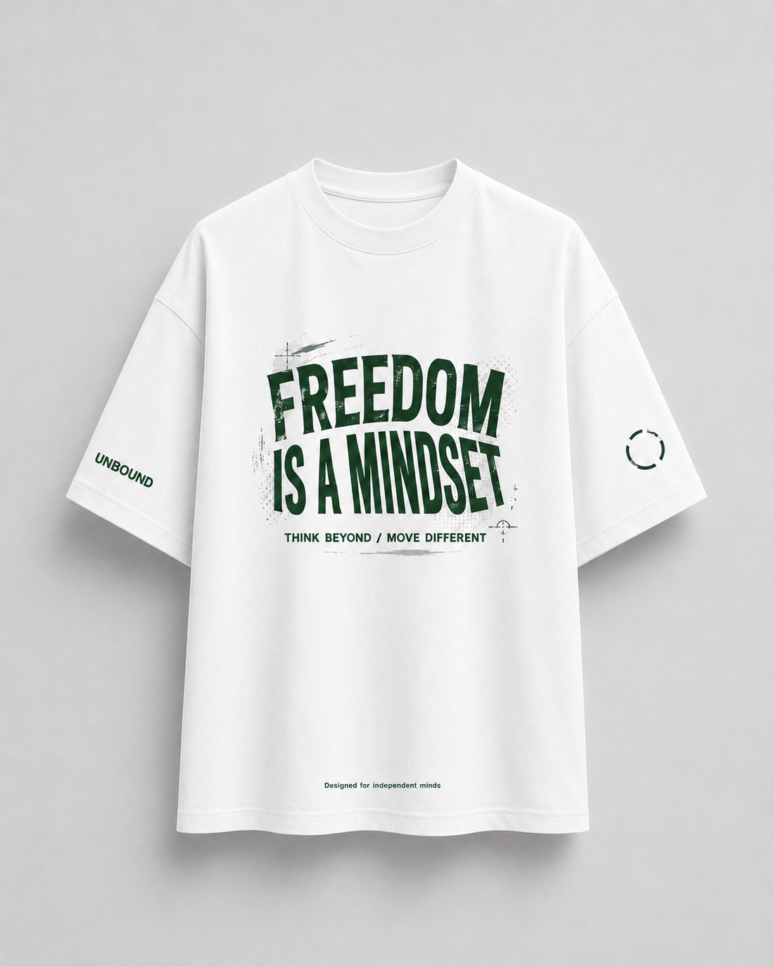 A promotional graphic for an AUA&CO 'Pack of 2' Freedom Edit featuring two graphic t-shirts: one black and one white. The black shirt displays 'STAY FREEDOM' in bold white and green text, while the white shirt displays 'FREEDOM IS A MINDSET' in green and black.