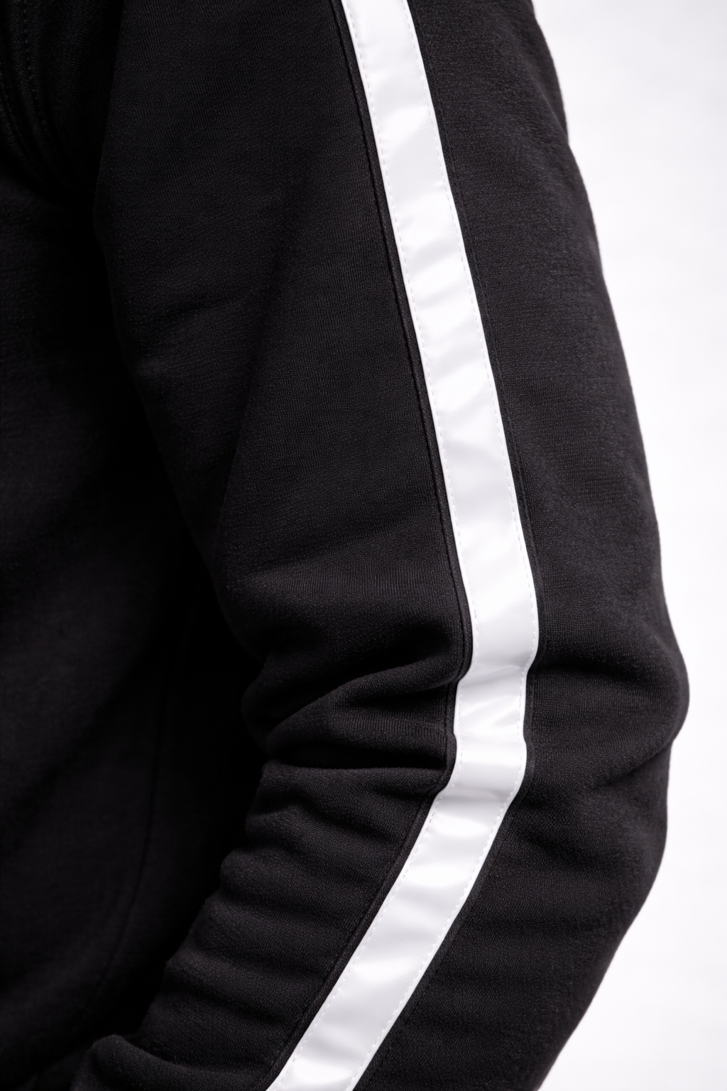 Black jacket with a white stripe on a white background