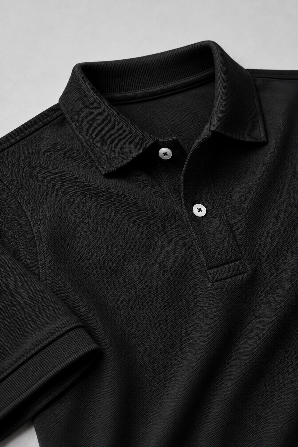 Four polo shirts in navy, gray, black, and blue on a light gray background with 'Free Delivery' text.