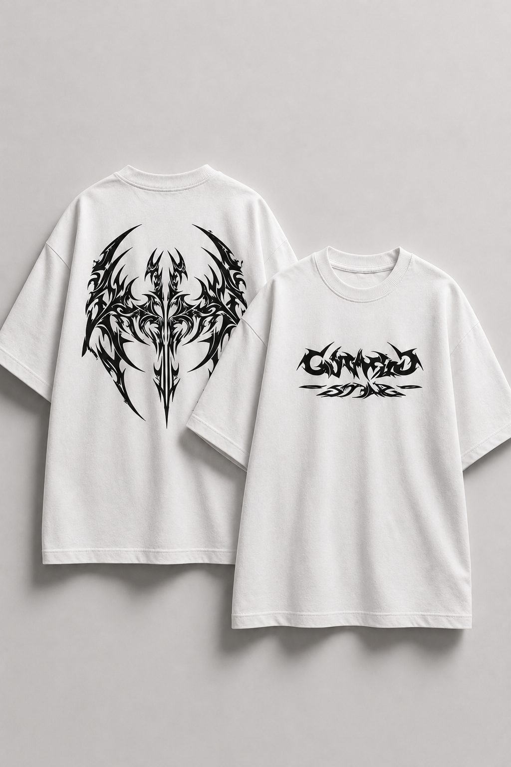 Two white t-shirts with black tribal designs on a gray background