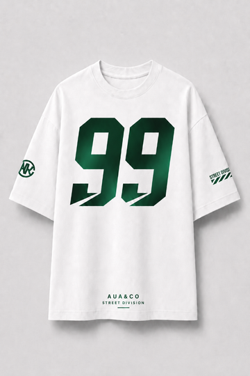 White short-sleeve t-shirt with a large green '99' graphic on the front, a green circular logo on the right sleeve, and 'AU&CO STREET DIVISION' printed in green on the left sleeve and lower hem, shown against a light gray background.