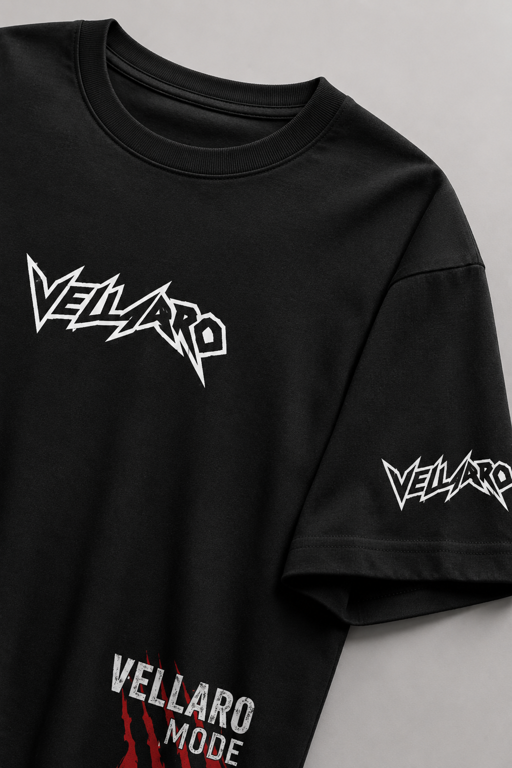 Black t-shirt with red and white graphic design on a gray background